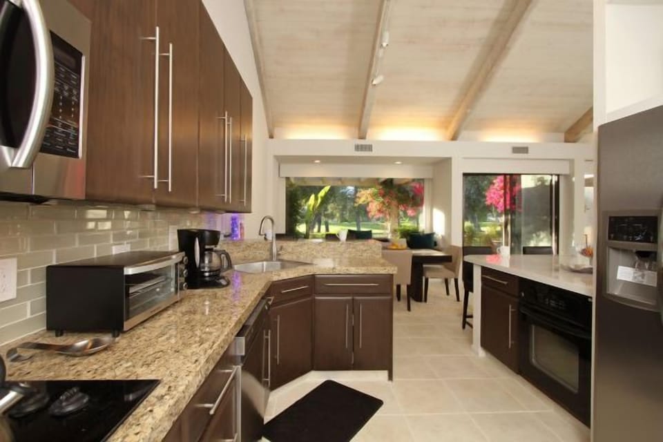 All new appliances in kitchen, facing patio and golf fairway
