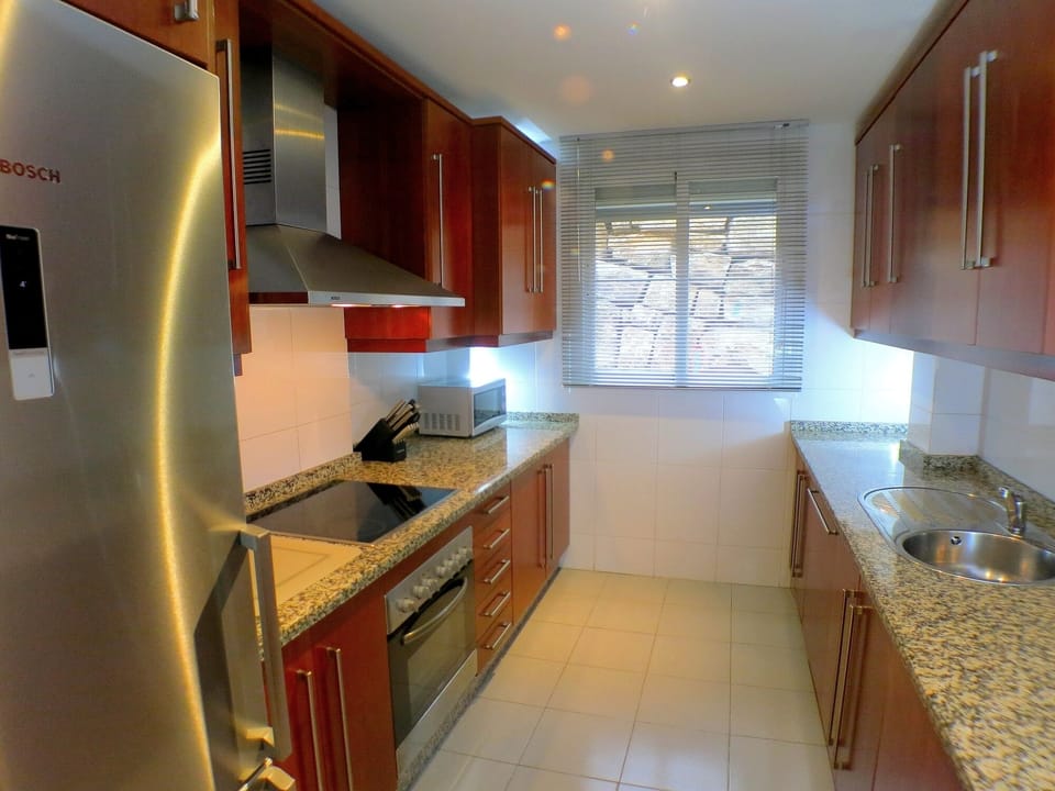 Fully furnished kitchen with dishwasher, washer & dryer, large fridge, etc.