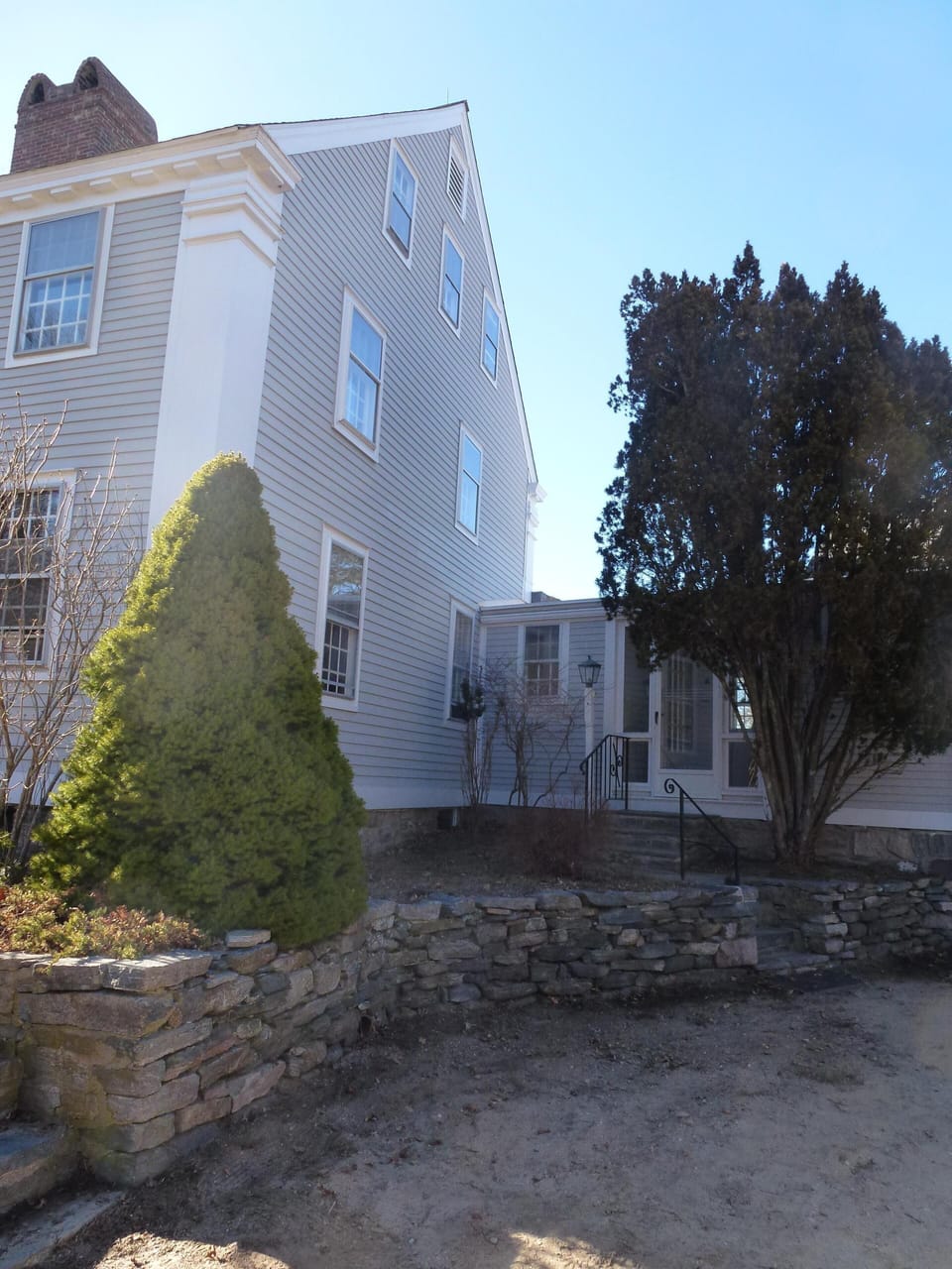 Shared entrance to the apartment (right) and house