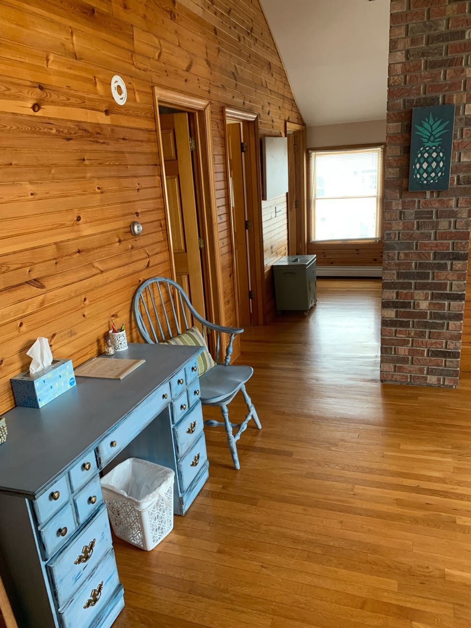 Upper level landing leading to laundry room