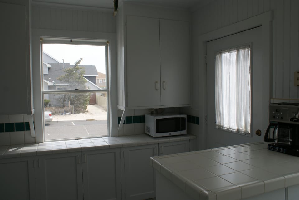 Kitchen with fully stocked cabinets