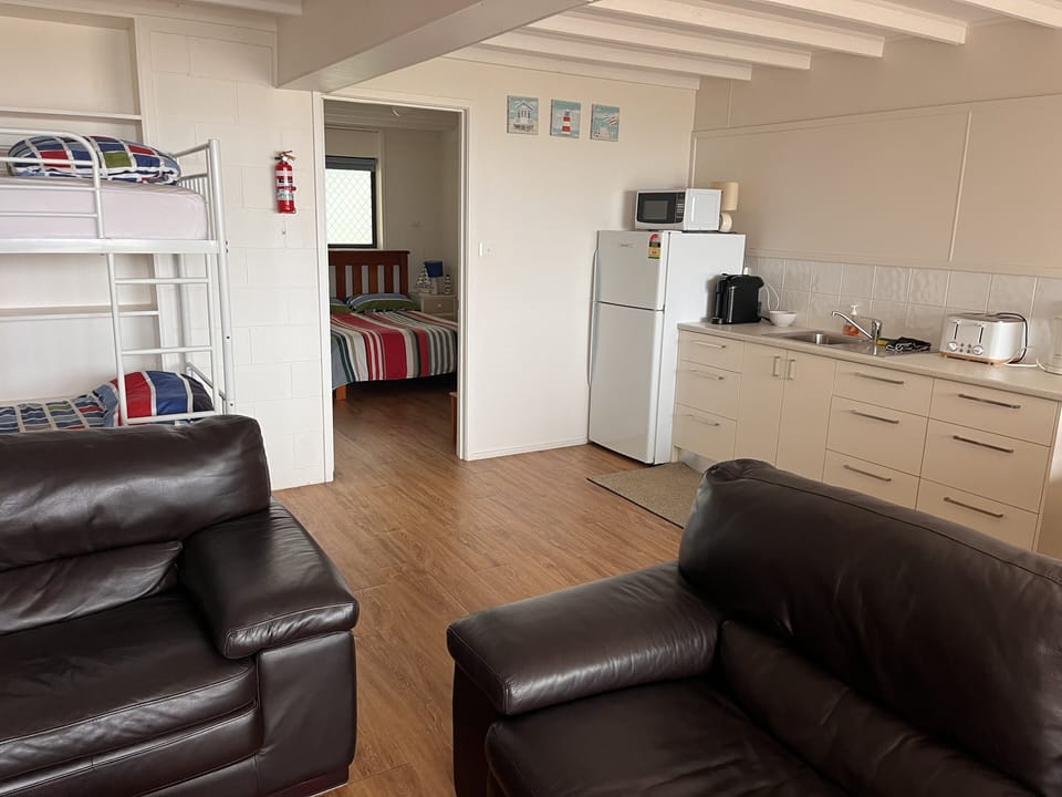 Downstairs includes double bed with ensuite, bunk bed set, kitchenette & tv area