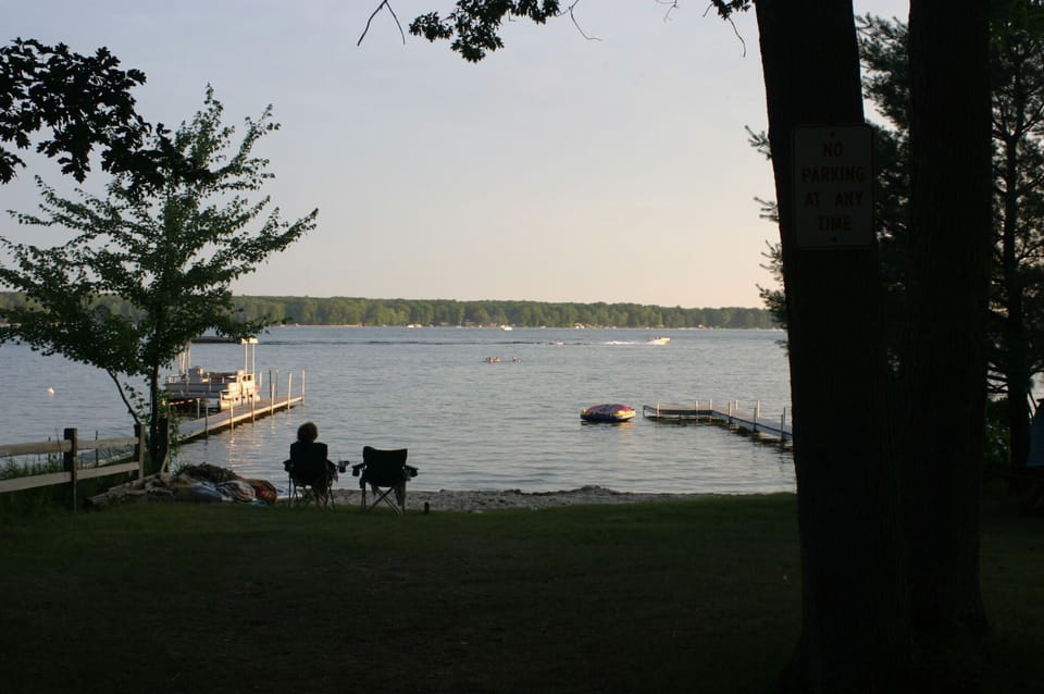 Beach Access directly across the street (docks are private).    Sandy beach !