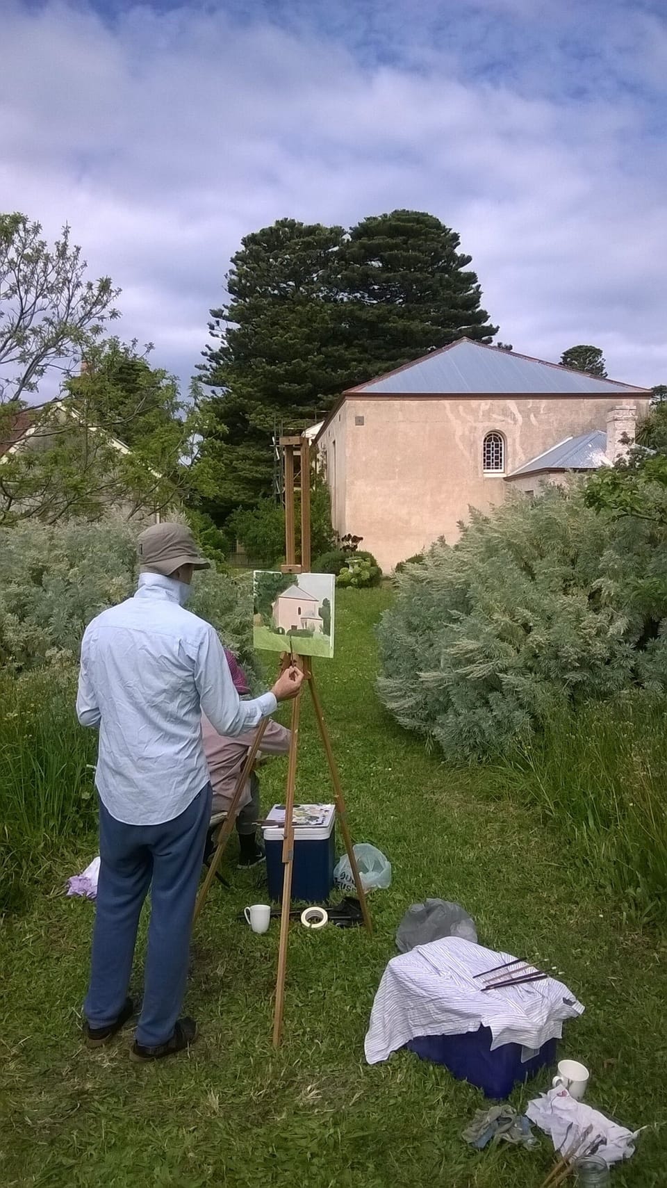 Guests painting the rear view of Old St Andrews from the orchard.
