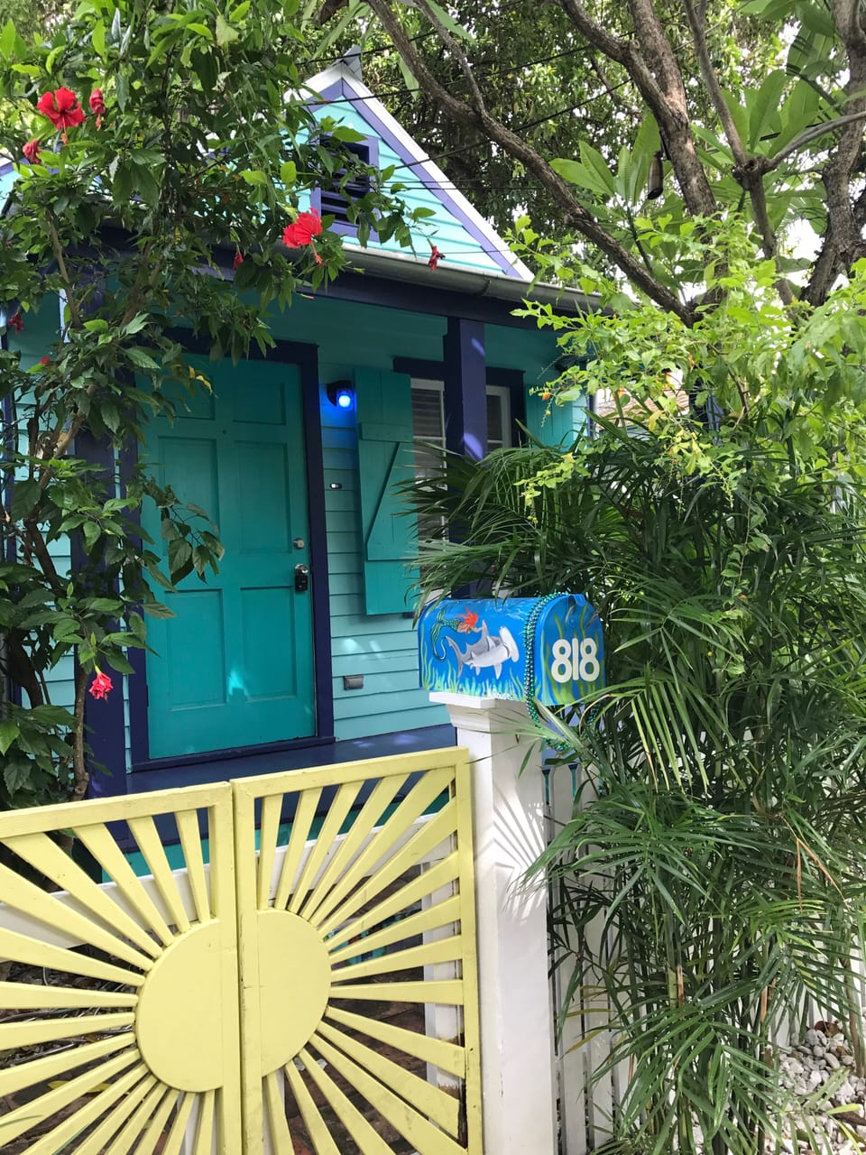 Attention to details.hand painted mailbox!   Bike rack inside gated compound