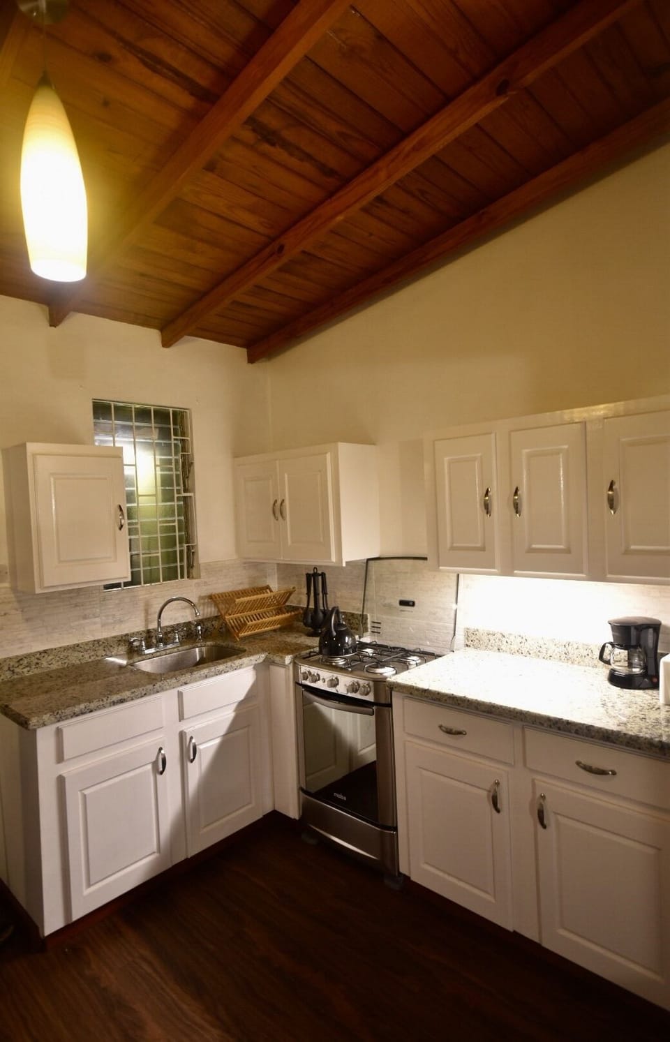 New kitchen with granite counter tops.