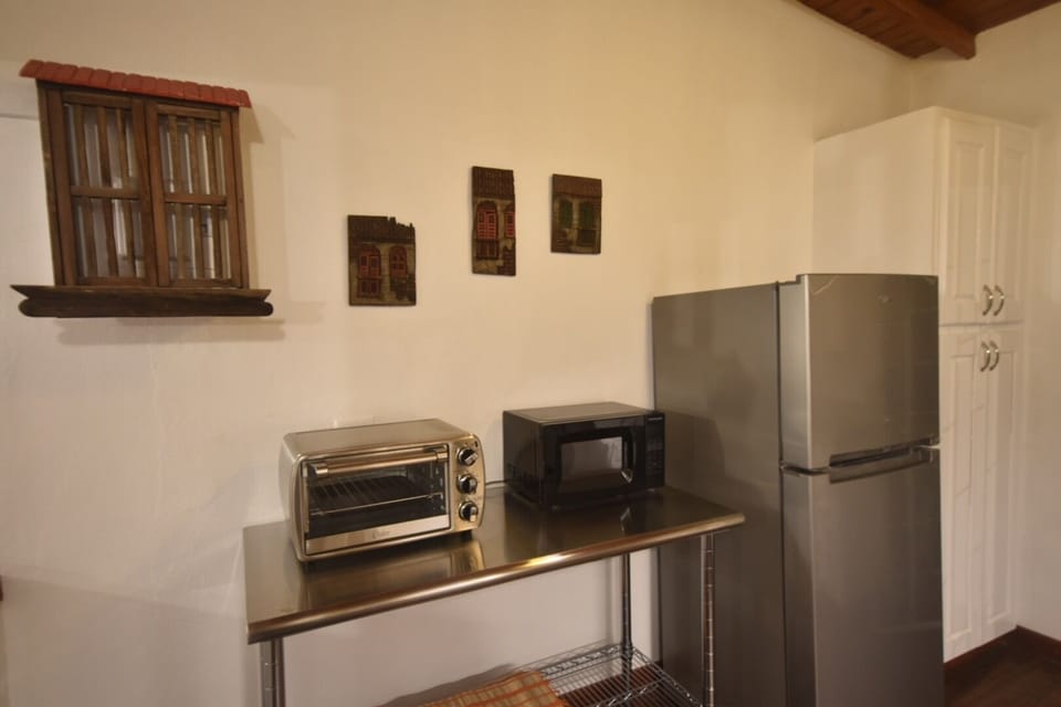 Fridge, microwave, and Toaster oven.