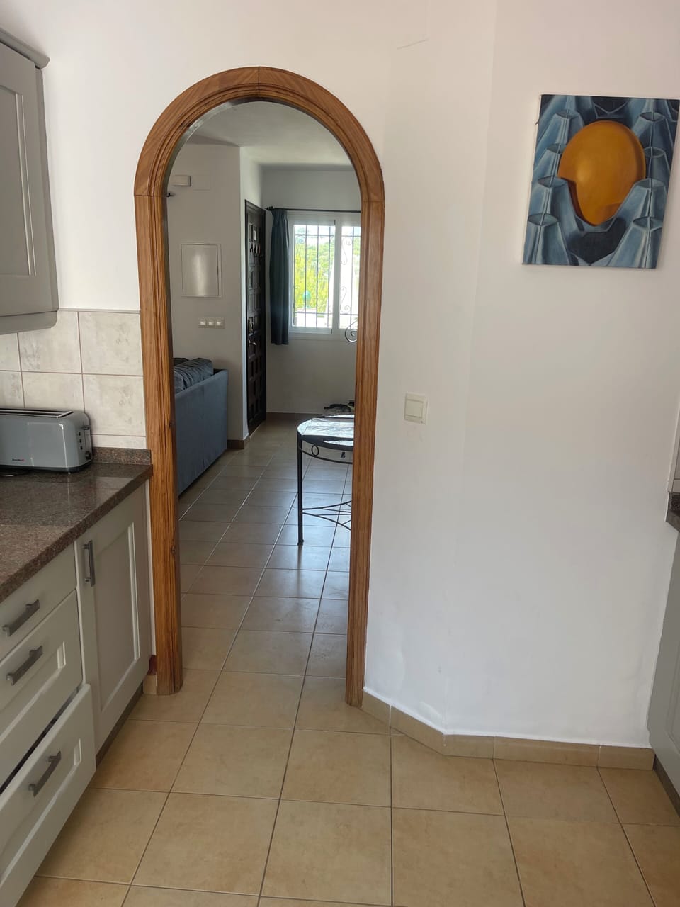 View from the kitchen leading to the spacious lounge