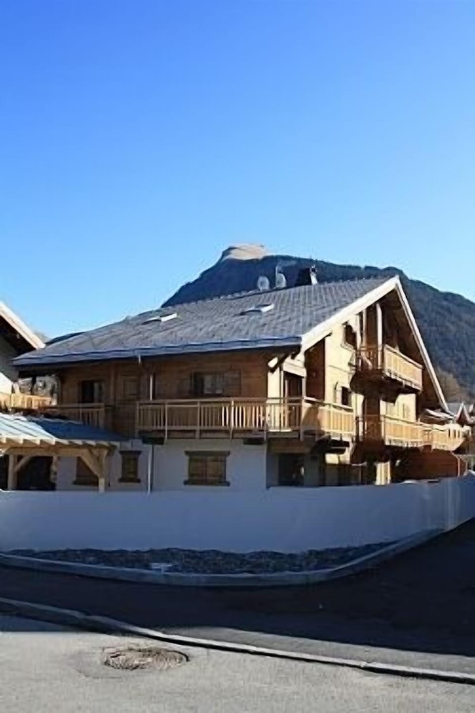 Le Cofy apartment Building in Summer.