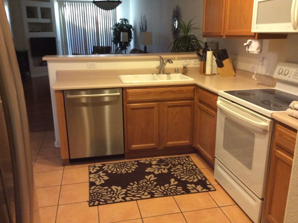 Well equipped kitchen with double sinks and quiet Bosch dishwasher