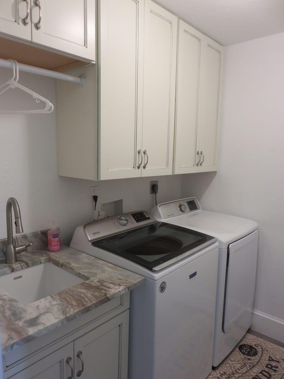 Large capacity washer and dryer with laundry room sink
