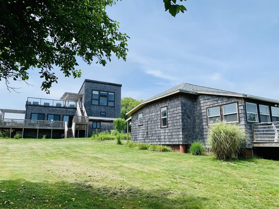 Rental cottage shares a half acre with owner’s home 