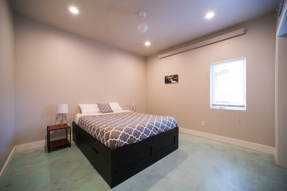 Bed again, nightstands on each side