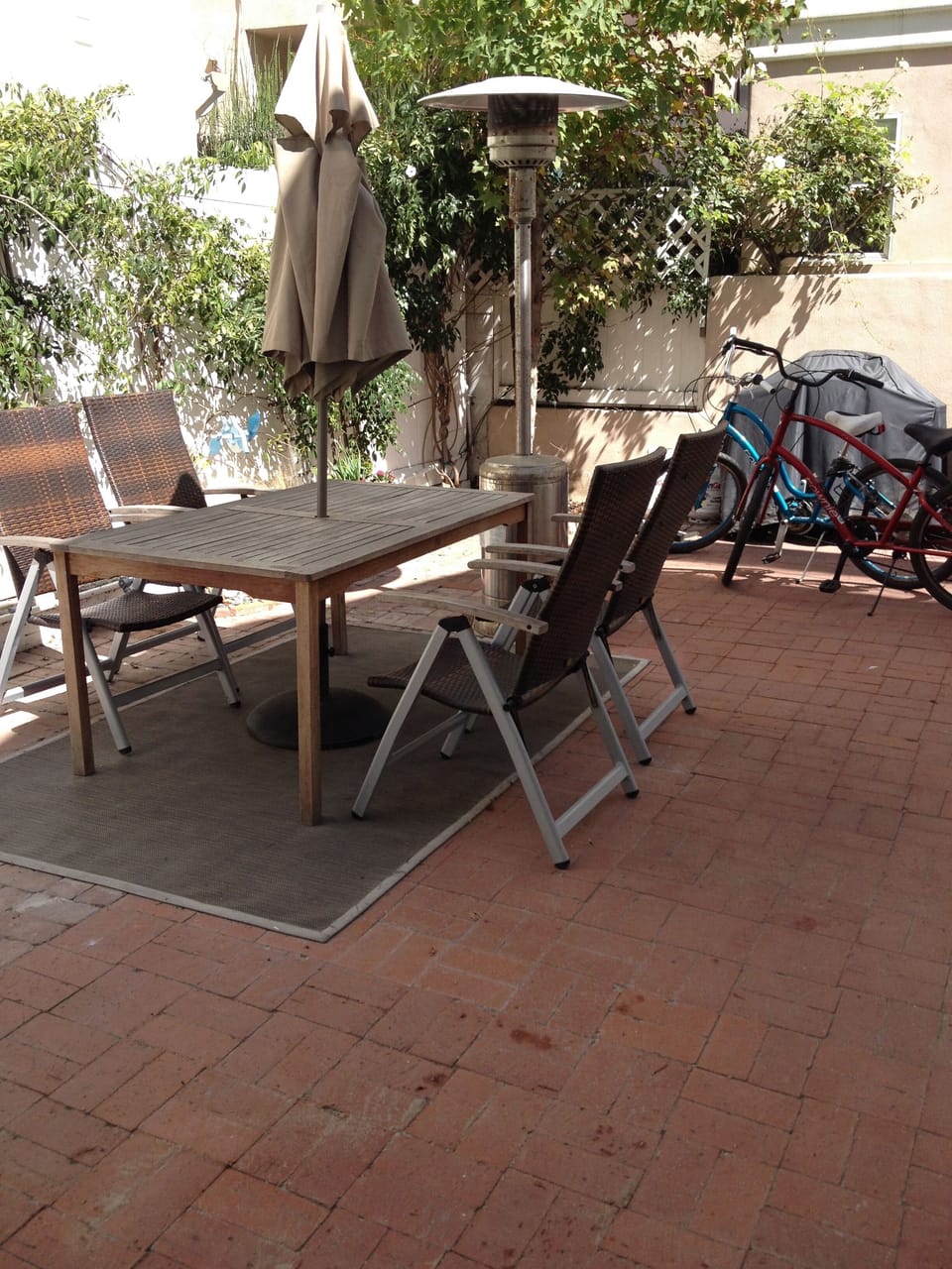 Enjoy a relaxing day on the patio with dining for four