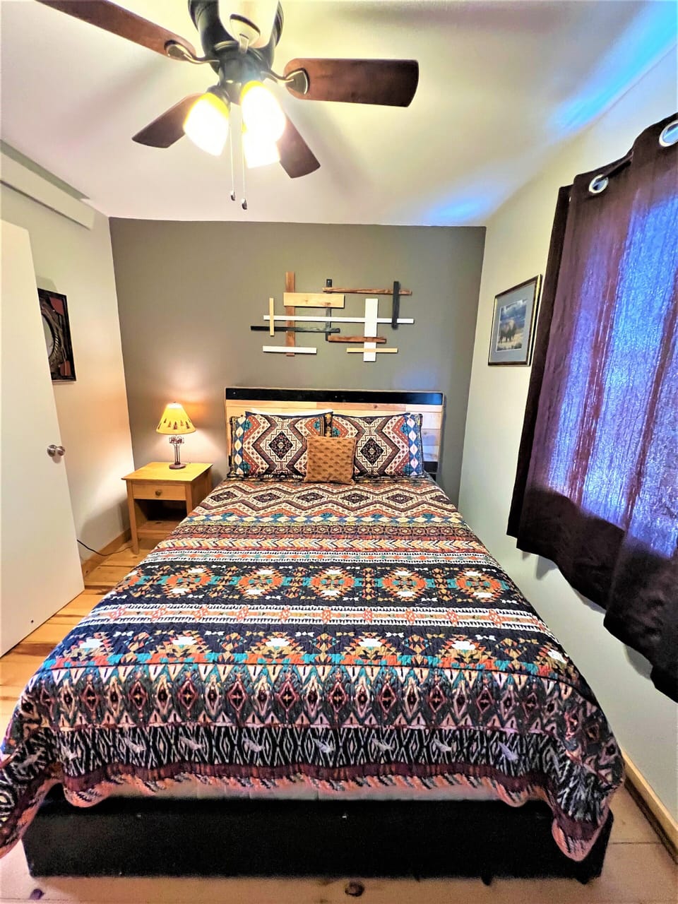 Queen bedroom with AC unit