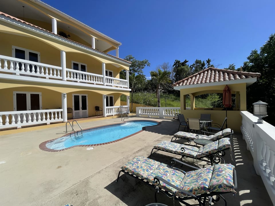 Tres Soles poolside apartment is located on the lower level, opens to pool deck