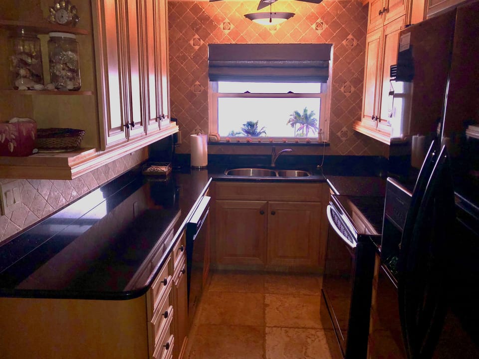 Granite counter tops accent a fully updated kitchen.