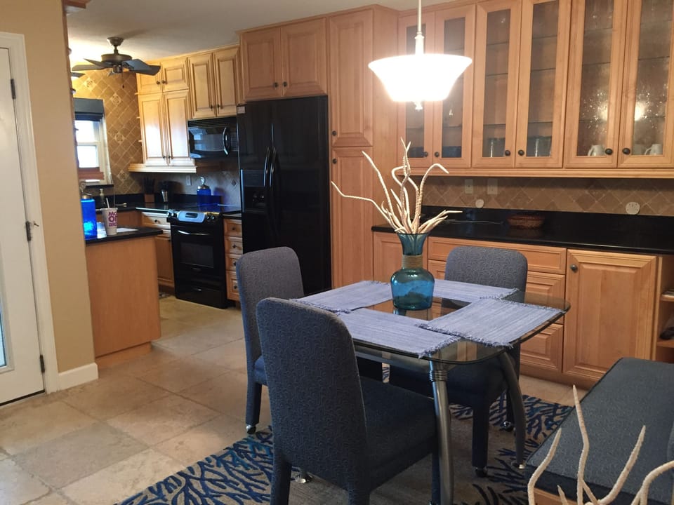 View into the kitchen.  The kitchen sink looks directly over the gulf.
