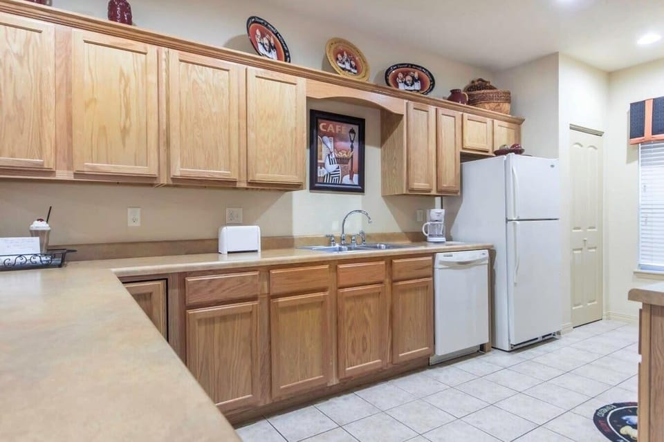 Kitchen includes full-size appliances.