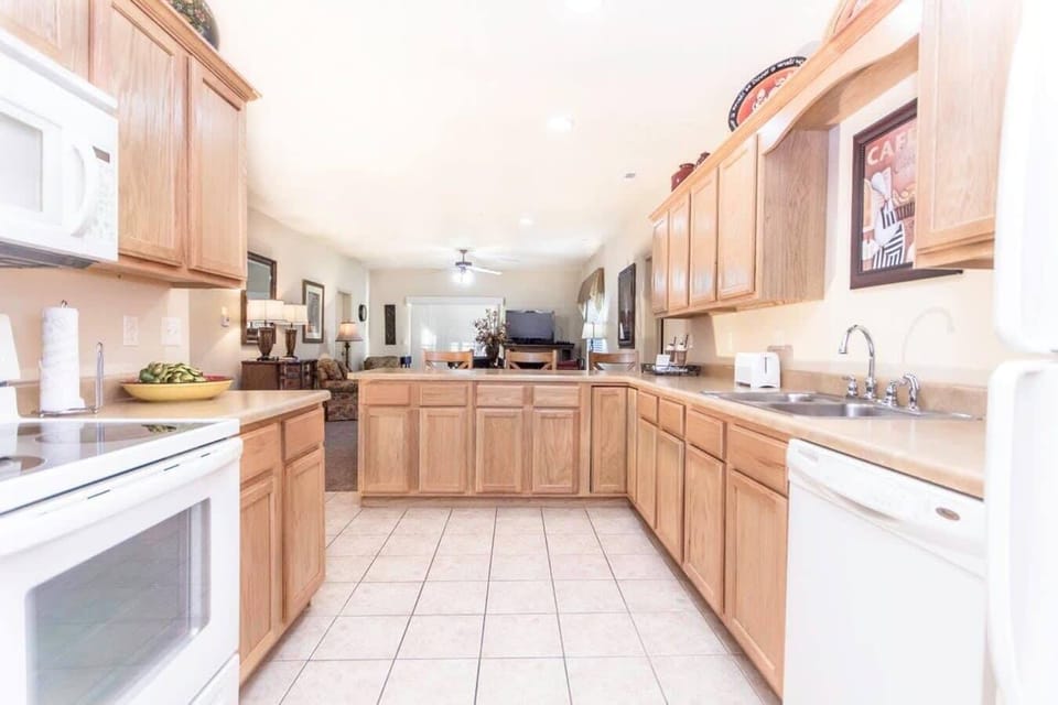Kitchen includes full-size appliances.