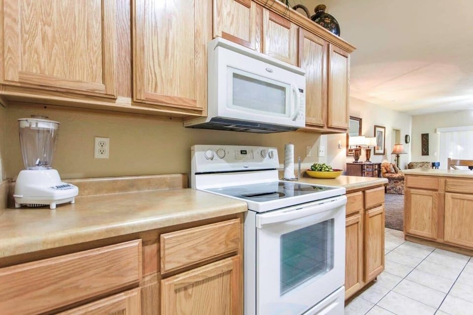 Kitchen includes full-size appliances.