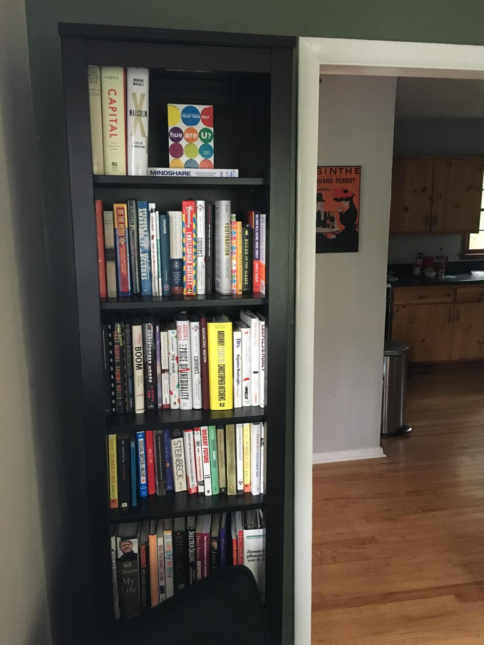 Library with over 100 books.