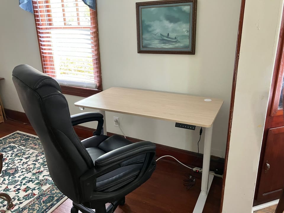 Adjustable height desk and office chair
