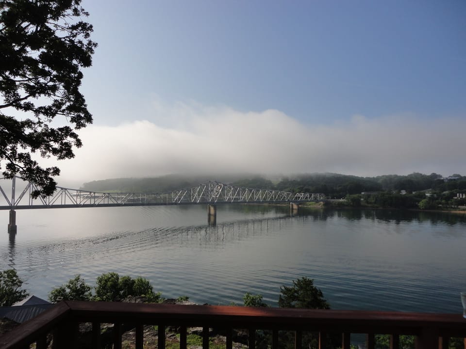 Watching the morning fog lifting - view from the deck.