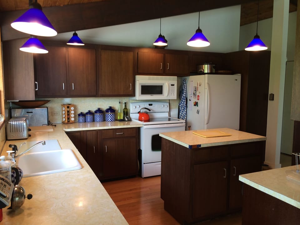 Kitchen, well appointed, well provisioned, well lit.