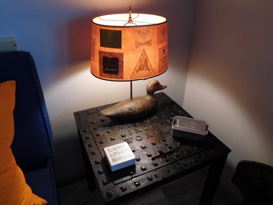 End table made from a manhole cover recovered from Big Bend Natl. Park