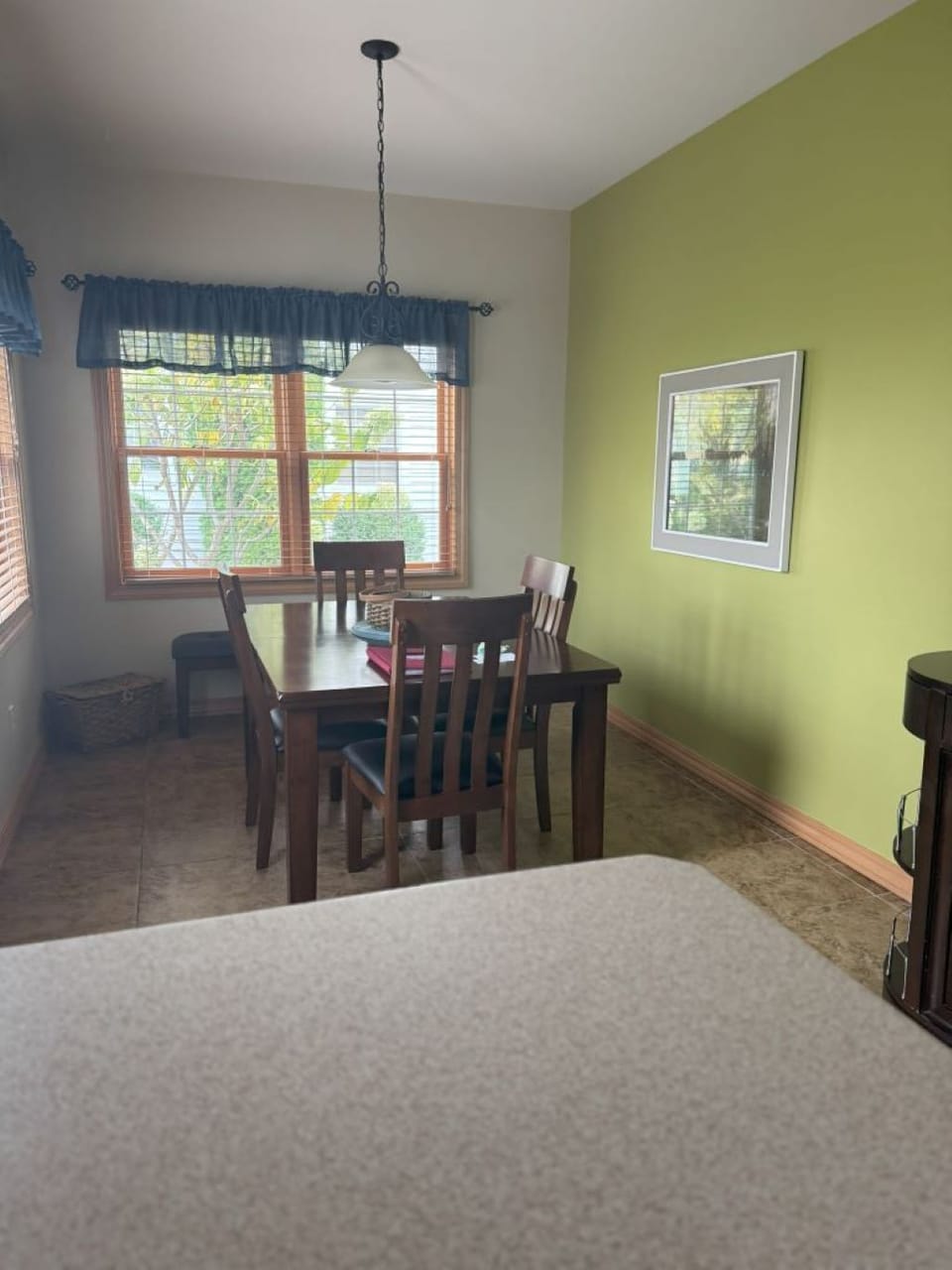 Dining area with view and door to patio