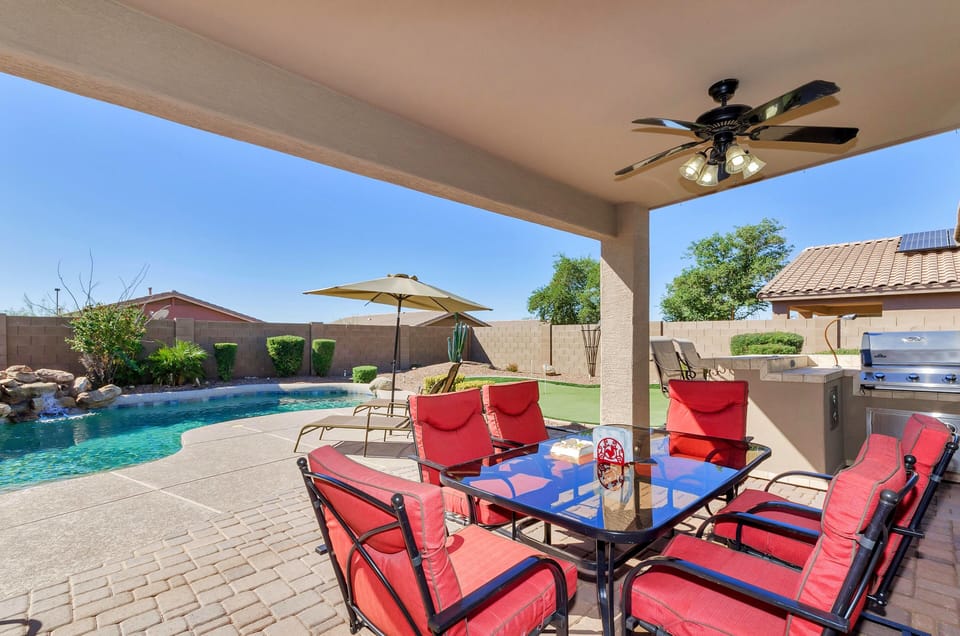 Resort style back yard with Putting green and built in BBQ and Fire pit