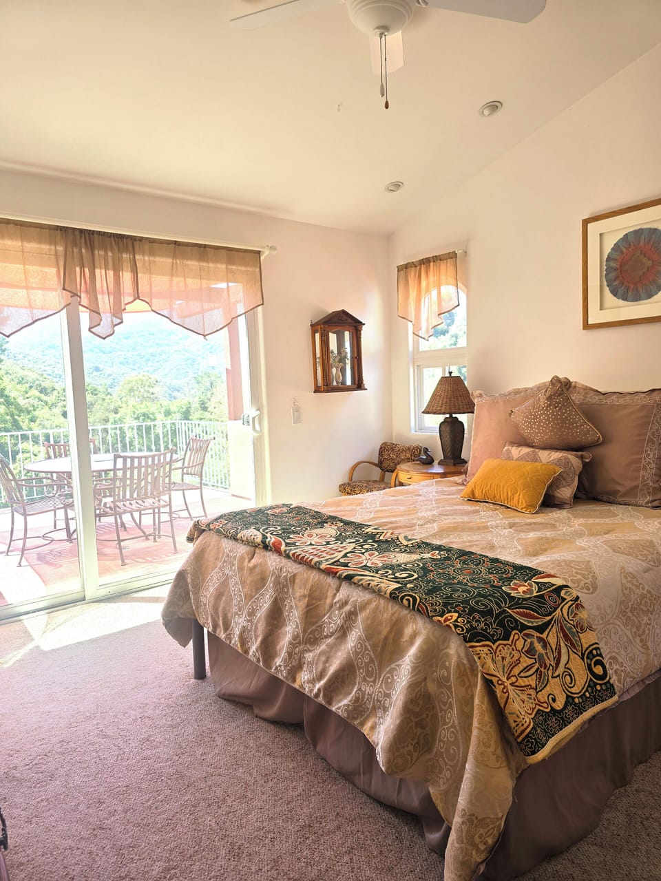 Master Bedroom with large private  patio; decorated with original art