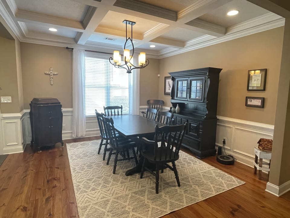 Formal dining room with seating for six.