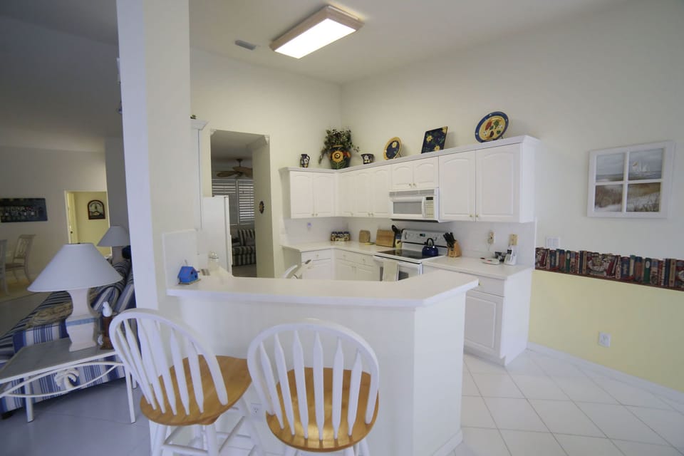 Another view of the kitchen from the breakfast bar. 