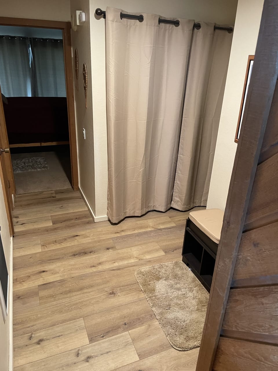 New wood flooring in hallway and bathrooms