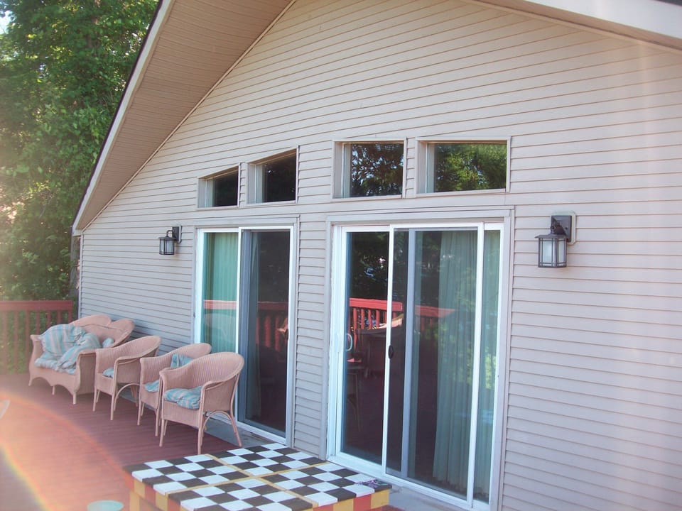 Upper deck connects to kitchen and living room.
