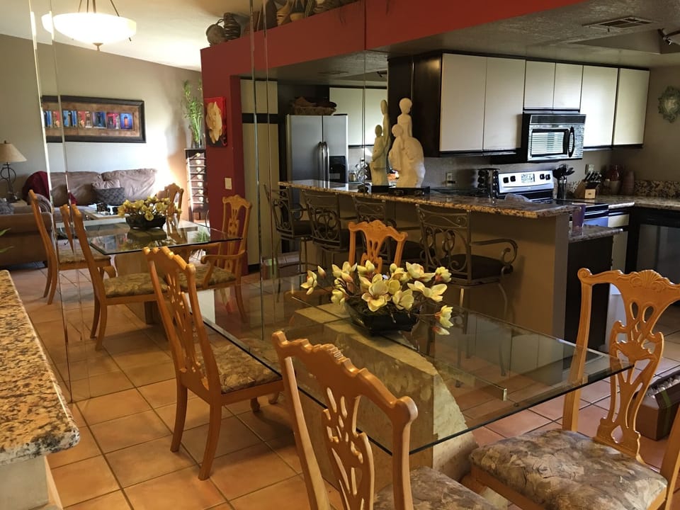 Dinning room and kitchen with upgraded granite counter-tops and stainless steel