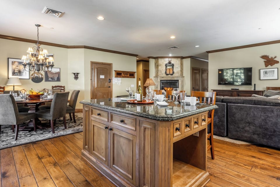 Open concept living connects the kitchen, dining, and living areas, making it easy to gather and spend time together.