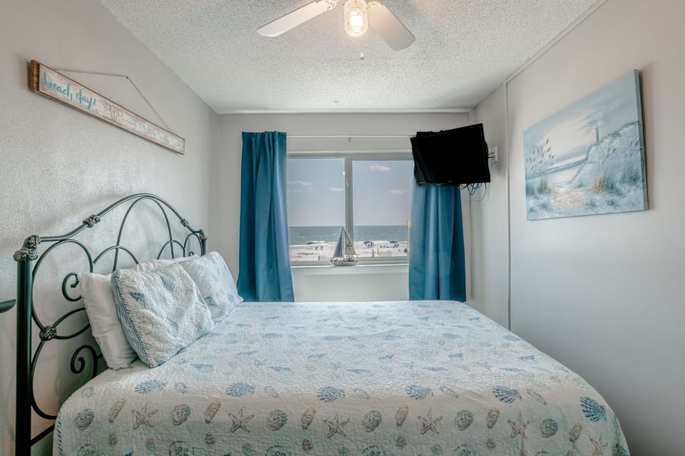 Beachside bedroom with flat screen tv