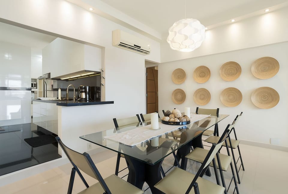 Dining Area With Air Conditioner and Kitchen