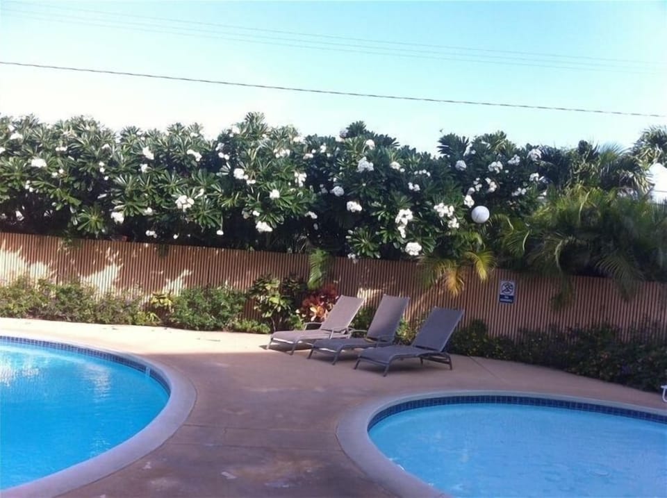 Poolside relaxation is also an option at Puako Condo #303!