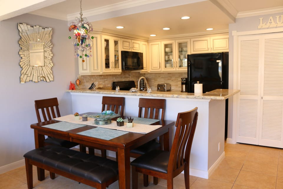 Dining and Kitchen areas with Recess Lighting.