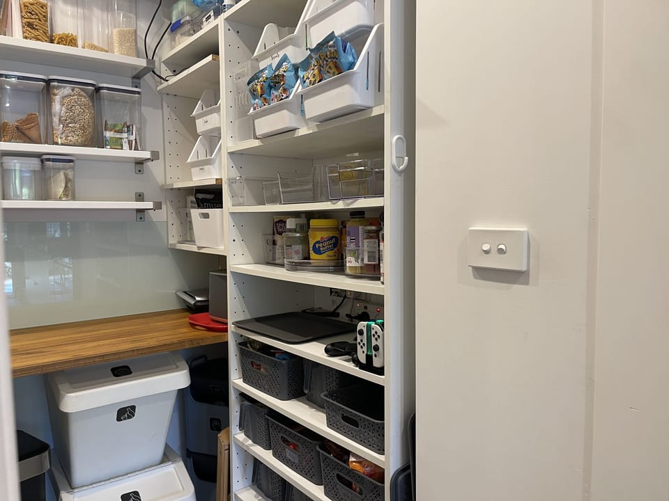 well stocked pantry with all the small appliances including a thermomix