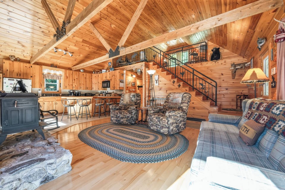 Living area with stairs to loft area