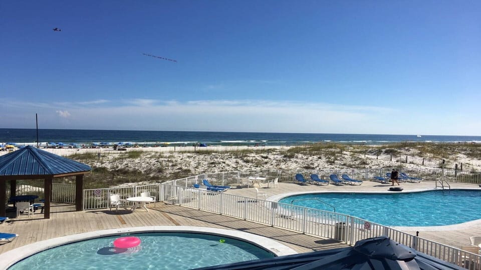 Beautiful Gulf just a few feet from Sugar Beach Condominiums with four pools