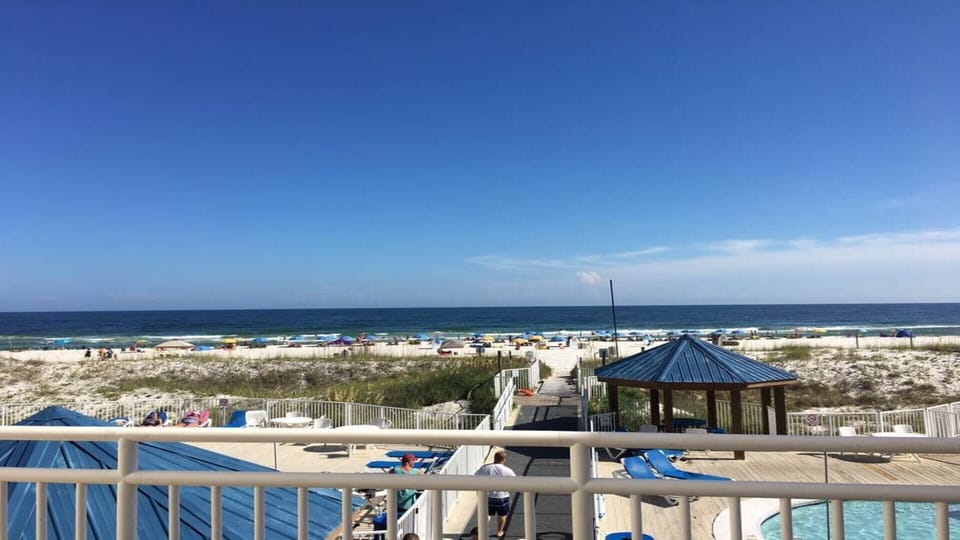 Short, short walkway to sand.