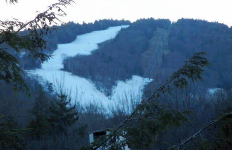 view from master bedroom window notice the date yes snow. very close ski home