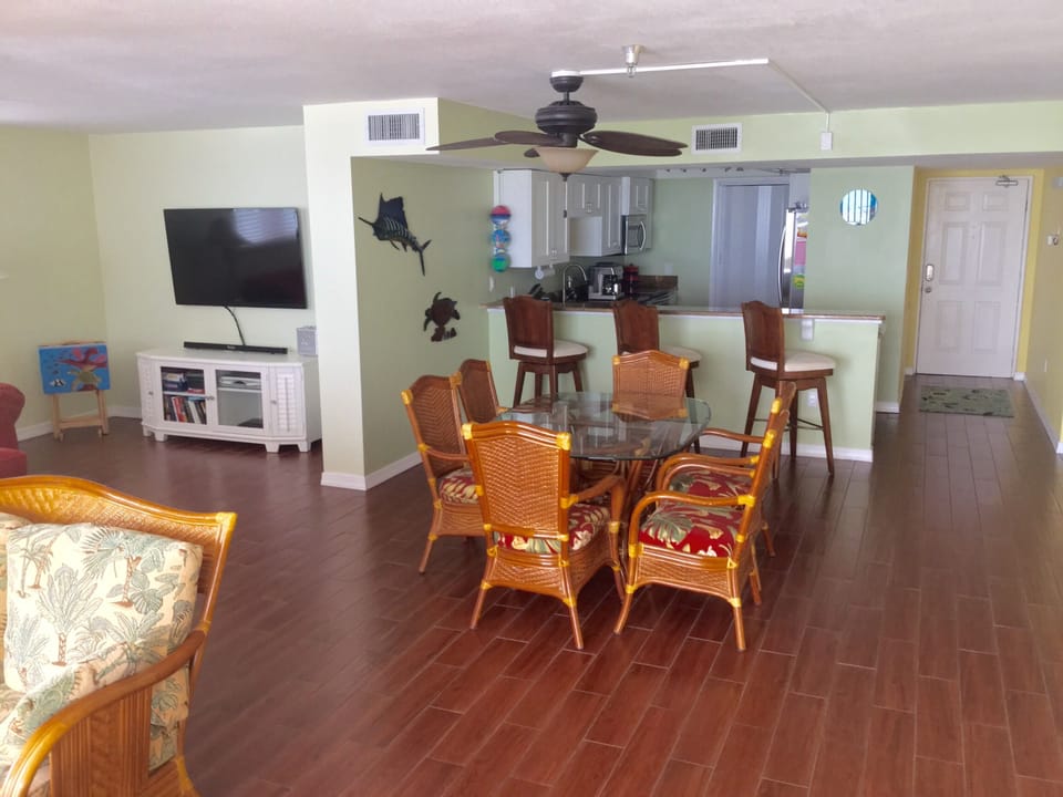 open floor plan with gulf water views throughout the unit