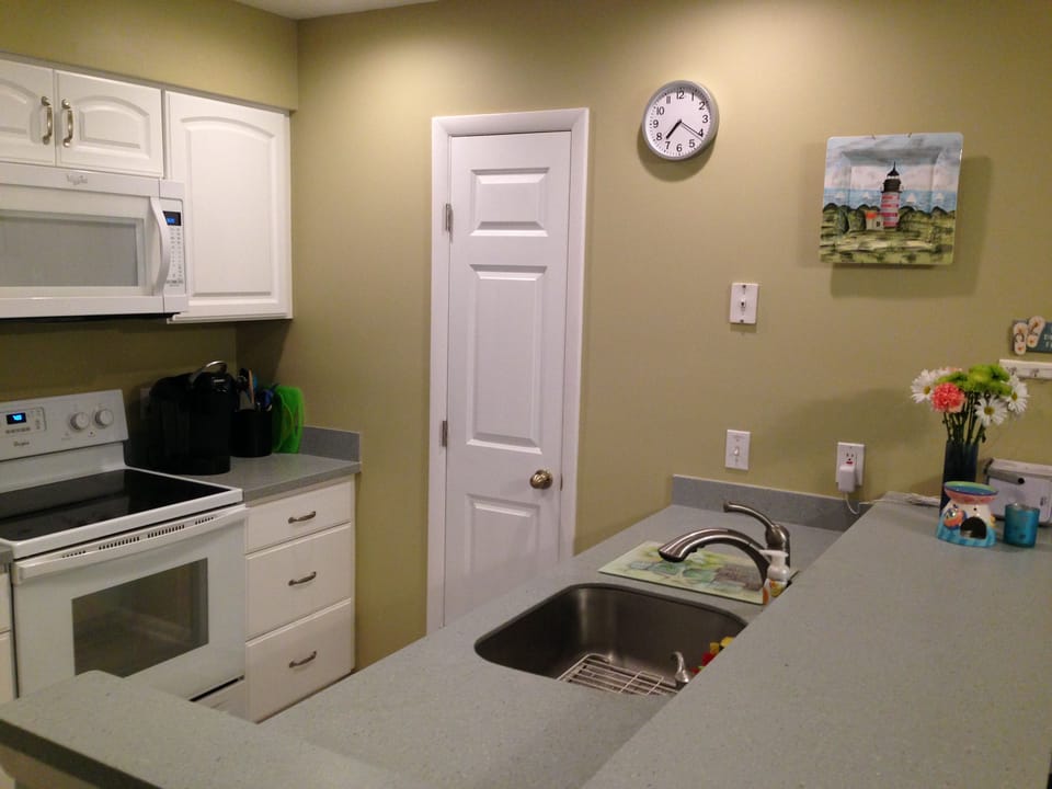 View of kitchen showing pantry.